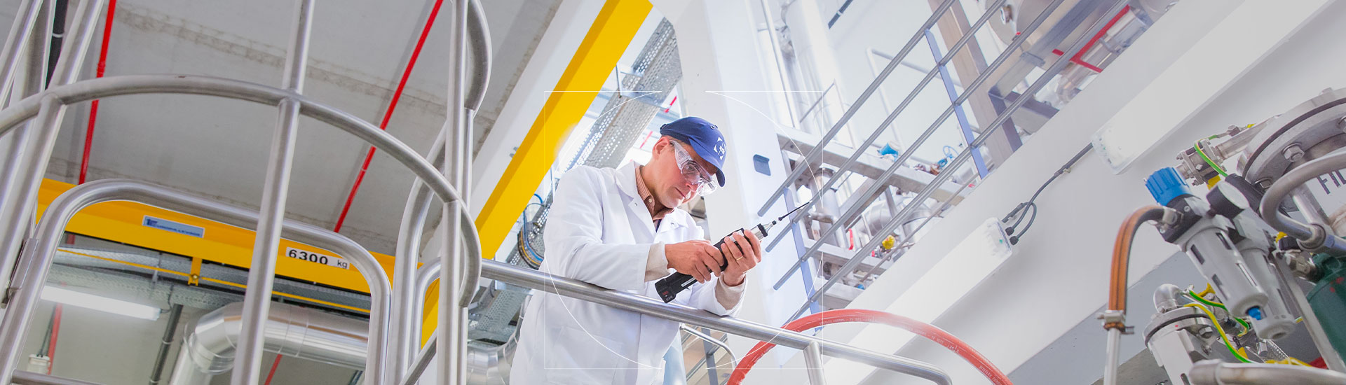 UCB scientist looking at a tool in a research lab